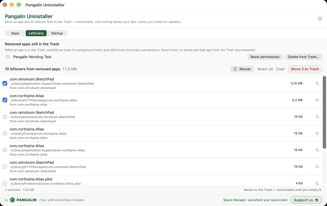 The Leftovers tab: a Removed apps still in the Trash card with Reset permissions and Delete from Trash, then 10 leftovers from removed apps, 17.9 MB, each with its path and the app it came from; two are ticked and the button reads Move 2 to Trash.